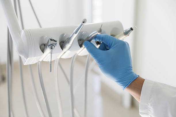 Professional Tooth Extraction technician working in Pine Island, TX